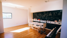 Chalkboard paint is utilized in this classroom look study and play room for the little ones.