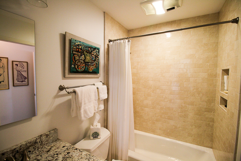 Classic subway fashion tile shows well in this tub surround.
