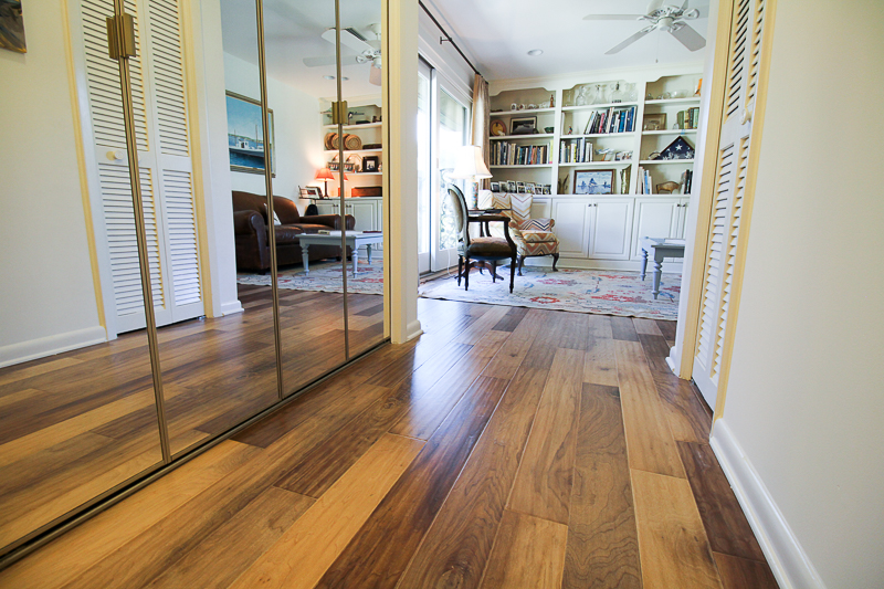 Distressed wood floors are commonly used. This floor is made from walnut with a satin finish.