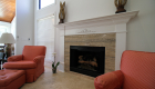 Natural stone surrounds this fireplace.