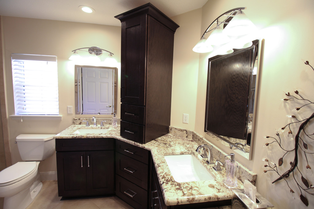 Cabinets with quarter sawn oak and a dark stain compliments the space.